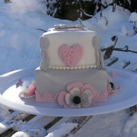 Romance At The Snow for a young couple that bought a house. guess what was hanging on the walls in their new home? angels! so they liked the cake very much!