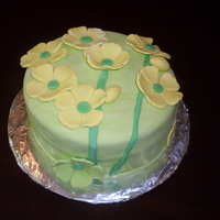 Lemon Yellow Birthday Cake MMF over WASC cake with lemon curd filling. I snuck a little MMF lemon on there, LOL. I am new to cake decorating (a few months).