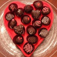 Valentine's Box Of Chocolates My second time working with fondant. Heart shaped cake with 'cake ball' truffles on top.
