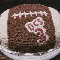 Football Cake Made this for a little boy who plays football at Dundee Central School...chocolate cake with chocolate buttercream frosting