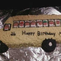 School Bus Cake Made this for my Mom...she is a school bus driver. Fondant faces, she is in the drivers seat and each of her 10 grandkids are in the other...