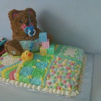 Teddy Bear Baby Shower Cake Made this for a baby shower...half sheet cake (half chocolate/half vanilla) decorated to look like a quilt, teddy bear is pound cake and...