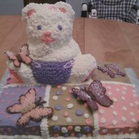Bear And Butterflies Baby Shower Cake For a baby shower...3D bear is made out of rice crispies, butterflies are made out of chocolate melts. Half sheet cake is half vanilla,...