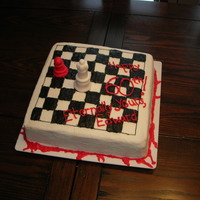 Twilight Chess Board Made for my Mom's 60th birthday. She loves Twilight! That's frosting blood down at the bottom of the cake.