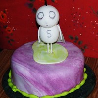 Stain Boy Tim Burton's Stain Boy, fondant, fondant-covered skewers for legs. Head and body are fondant-covered styrofoam.