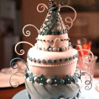 Blue White Seussical Cake Three tiered slightly topsy-turvy cake with wired gumpaste curls and embellished hat. Design based on Colette Peters' Dr. Seuss-...