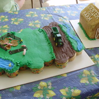 Farm Birthday my son asked for a farm/tractor cake like he does every year! the barn is shaped from loaf pans and the farm scene is a cupcake cake. we...