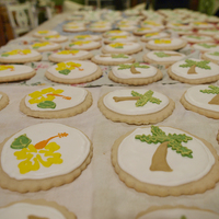 Tropical Sugar Cookies Decorated for a friends wedding and later packaged in cellophane baggies as wedding favors. Three styles: palm tree, yellow hibiscus, and...