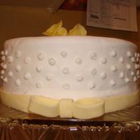 Mother's Birthday Cake This was the second fondant cake that I had made. The Roses are made out of fondant and were made for my mother in memory of my grandmother...