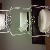 White Wedding Cake This was the first wedding cake we made. Since were not professionals, i think we did a pretty good job.