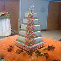 My Very First 5 tier wedding cake with calla lily and 5 petal flowers. flowers are 50/50 gumpaste and fondant. Thanks to CC especially member Emmibell...