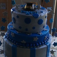 Silver And Blue Grad Cake silver and blue grad cake fondant stripes, stars and dots airbrushed silver stars sticking out were made with gumpaste and then airbrushed...