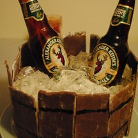 Beer Bucket Cake WASC with chocolate MMF filled with fireball whisky cream filling. Gelatin ice cubes and sugar beer bottles...it was sooo fun to make, can...