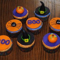 Halloween Cupcakes! I made these for my son's Halloween party at daycare,,,soo fun to make! Everything is MMF with buttercream underneath to stick it on...