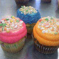 Nerds Cupcakes Cupcakes with nerds baked into them and crushed gobstoppers used as a garnish on them.