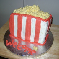 Bag Of Popcorn A "Welcome" cake for movie night! Cherry chip cake, and cherry filling, buttercream icing and decorations. Even the popcorn is...