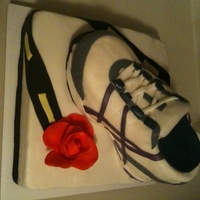 Cystic Fibrosis Marathon Cake This cake I made for a Cystic Fibrosis benefit. All yellow cake with a chocolate ganache filling and covered with MMF. Many more hours for...