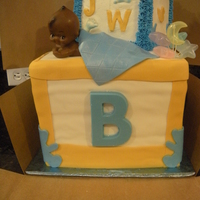 Abc Blocks Baby Shower Cake This was my first time using a dummy cake to give the bottom block height. It is a 10in' white cake buttercream frosting covered in...