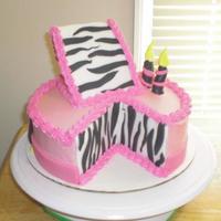 Zebra Slice Cake Rainbow cake with strawberry buttercream icing. Fondant decorations. This was my first attempt at this style of cake. I thank all the CCers...