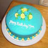 Mom's Cake White cake with buttercream icing and Wilton fondant covering & ribbon roses.