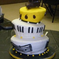 Topsy Turvy Piano Cake This was a fun cake. My daughter's High School Graduation. She loves to play the piano and she wanted a fun design, so here it is. the...