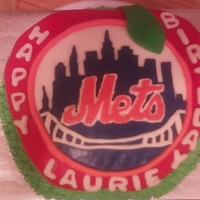 Mets Cake fondant covered orange and blue raspberry flavored cake with chocolate buttercream and fresh raspberries. all decorations fondant