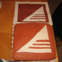 Logo This cake is a copy of the old logo for my place of employment. A picture of the logo is right above the cake. This was a 12" square...