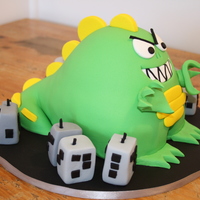 Godzilla A giant, building-crushing green monster formed with a dolly vardin tin.