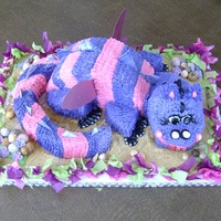 Purple & Pink Dragon Cake Carved dragon cake and buttercream icing.