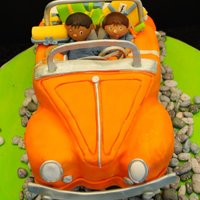 To Mobile I made this car cake for my son's second birthday. The car was carved from a 9x13" block of cake. The decorations are fondant and...