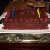 Birthday Cake Chocolate cake with chai tei infused dark chocolate filled raspberries. YUM!