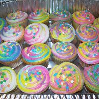 Multi-Colored Cupcakes I made these for my 6 year old to take to class today for her birthday. Super fun to make!