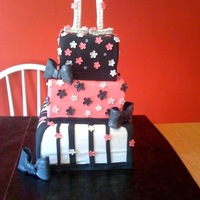 Pink/black/white Birthday Cake This is my daughter's 11th birthday cake. All fondant/gumpaste decorations with sugar diamonds. Thanks for looking.