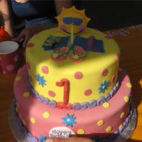 Fun In The Sun Two tier fondand cake with gumpaste decorations....