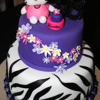 Hello Kitty Zebra Cake Cake done for my wonderful cousin...She practically came up with the design herself. So cute. Mini cake made by my niece Taylor.