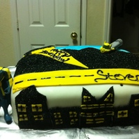 Batman Cake batman cake. easy to make. made out of fondant and black sugar crystals