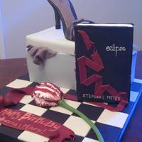 Twilight/shoebox Birthday Cake I made this cake for two friends with recent birthdays. One has an unabashed obsession with Twilight :) I styled the book, ribbon, board,...