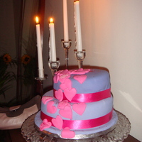 Purple 40Th Birthday Cake This was my first time making a two tier and was made in a heatwave so working first time with fondant was hard work. Photo doesn't do...