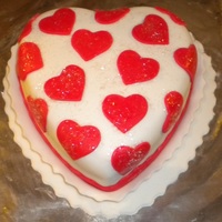 Heart Cake Fondant covered heart shaped cake with fondant heart cutouts