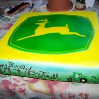 John Deere Cake This was a fun and quick cake. Chocolate cake with easy bavarian cream in the middle and BC and MMF on the top. It was airbrushed and the...