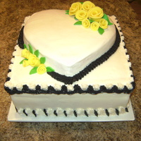Wedding Shower Yellow Roses Vanilla cake with vanilla icing, small single layer heart on a 10" cake. MMF roses with black accents.