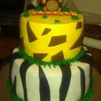 Zoo Themed Cake This cake was my first time make chocolate fondant and a monkey. or bear, whichever u see it as.lol