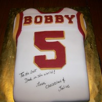 Redskins Jersey Cake Made for a good friends birthday. His wife asked for a Redskins themed cake that incorporated both his sons. Cake is Red Velvet with...