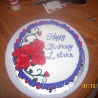 Birthday Cake Cake has roses on the top and the sides