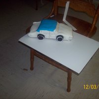 Car Cake this was my first ever 3D car cake that I carverd, I thought it came out pretty good.......note I've never went to school for cake...
