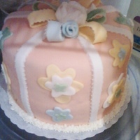 Another First Cake my moms otheer first cake. has mistakes but still looks good