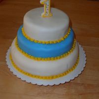 First Birthday Cake This cake was for my son's first birthday. The cake is covered in rolled fondant.