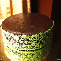 Triple Chocolate Cake Chocolate cake marbled with brownie and chocolate chunks. This was all covered with dark chocolate fondant.