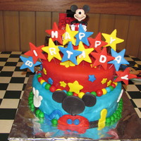 Mickey Mouse Clubhouse Birthday Cake This cake was for my twins 3rd birthday. It is covered in marshmallow fondant with marshmallow fondant decorations. The mickey mouse at the...