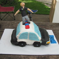 Police Car Cake i made this for a guy at work with autism. he always asks us questions about everything and he loves law enforement so i made him this.